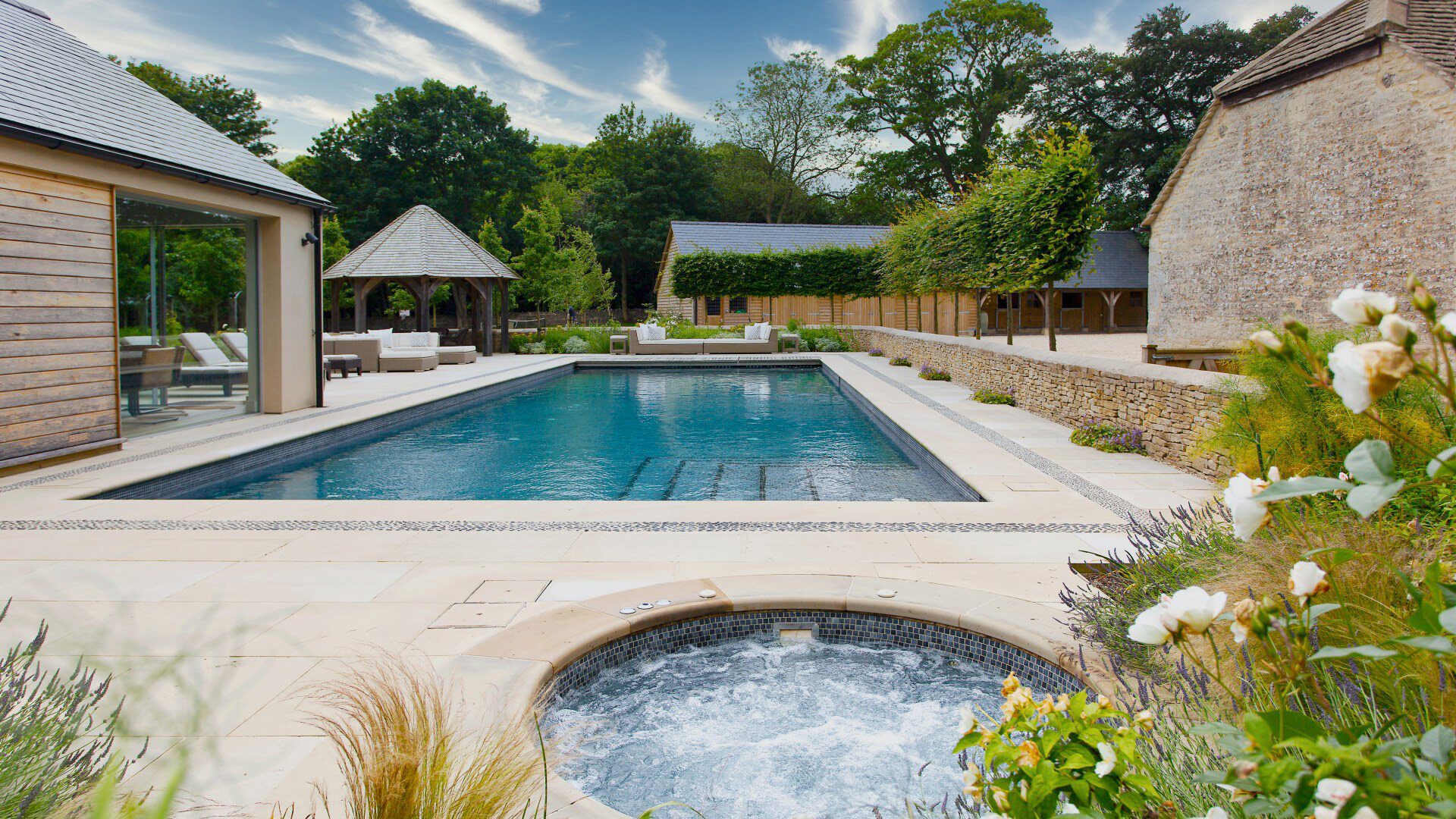 north lodge at blenheim park showing the pool and hottub