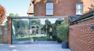 Glass side infill extension and glazed kitchen doors to Croft House