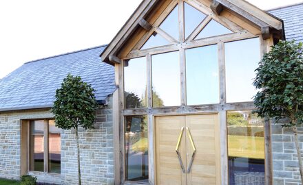 bespoke glazing into timber barn conversion