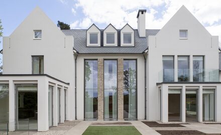 rear elevation of new build house with double height vertical sash windows