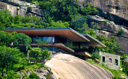 a cliffside house in zimbabwe by iq glass