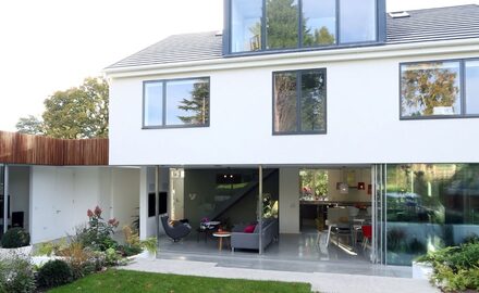 new build home using concave corner opening slim sliding glass doors