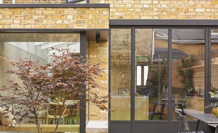listed townhouse extension in Hackney with steel framed glazing