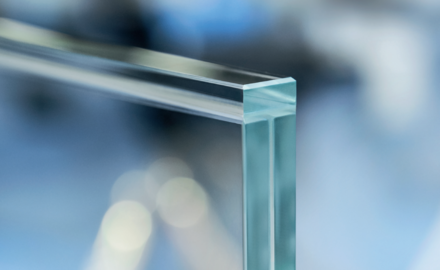 a glass balustrade with a glass capping